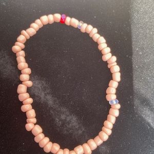 3/10 pink stones beaded bracelet